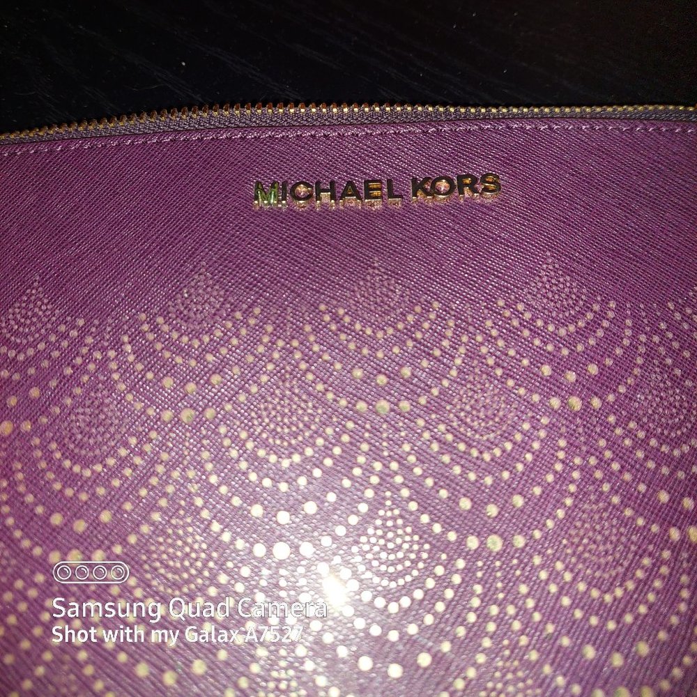 Micheal Kors purple clutch